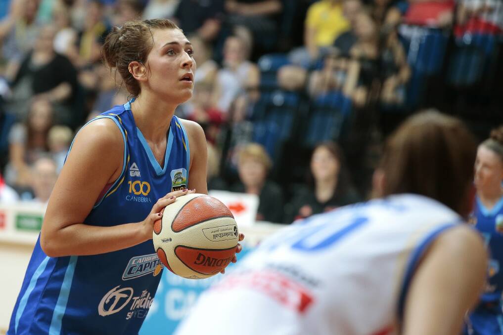 AIM: Canberra Capitals player Alex Bunton lines up a free throw. Picture: JEFFREY CHAN
