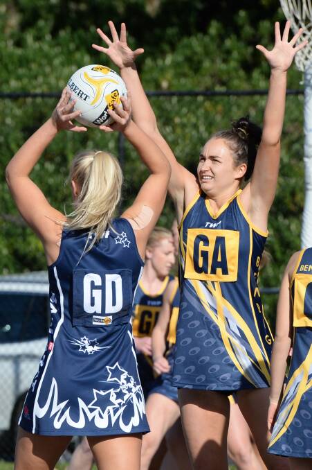 HANDS UP: Gisborne's Maddie Stewart attempts to defend the ball in the open inter-league match.