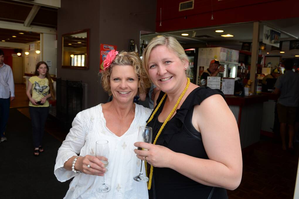 Heather Bissett and Nicky Conn watching the Melbourne Cup at the One Tree Hill Hotel. Picture: JIM ALDERSEY
