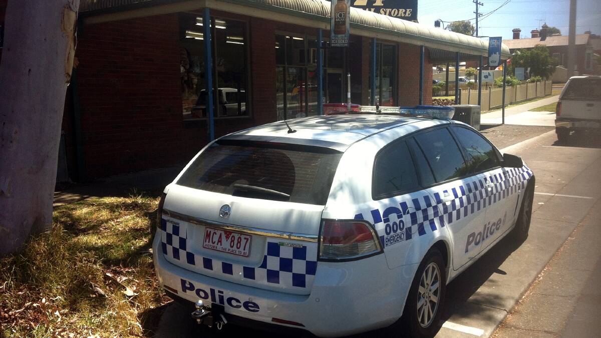 Police at the 24-hour store this afternoon. Picture: BLAIR THOMSON