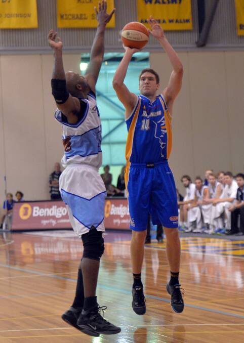 JUMP: Michael Vigor in action during the Braves game against Frankston.