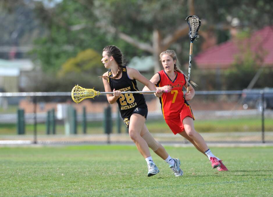 Shannon Robinson and Hayley Fuss. Western Australia v South Australia. Picture: JODIE DONNELLAN