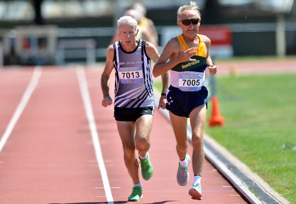 Barry Jones and David Close in the 1500m. Picture: BRENDAN McCARTHY
