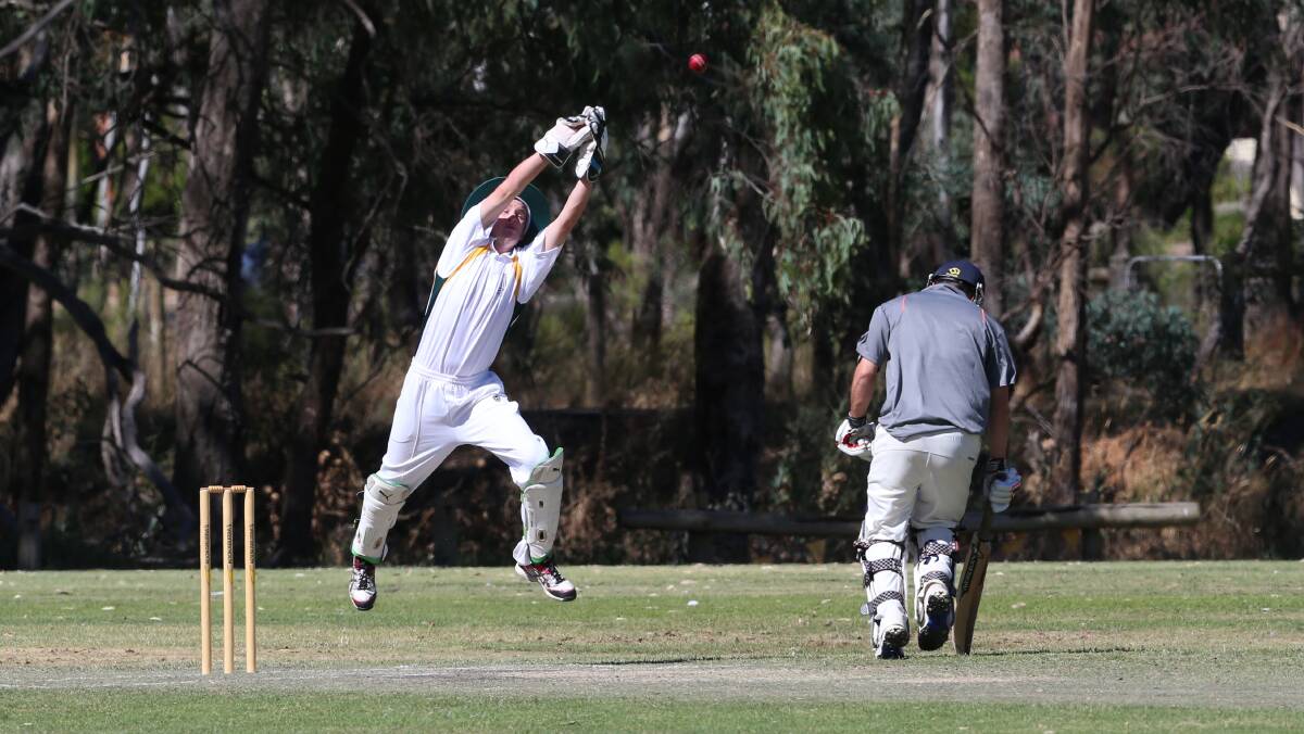 Country Cricket Week action at Bell Oval in Strathdale, Goulburn Murray (batting) v Castlemaine.
Bad return to keeper.

Picture: PETER WEAVING
