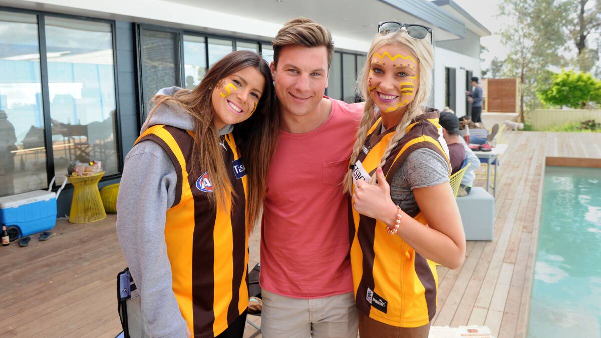 Raych Findlay, Jordan Pawsey and Elise Hore enjoyed grandfinal day at a house party.  Picture: JODIE DONNELLAN 