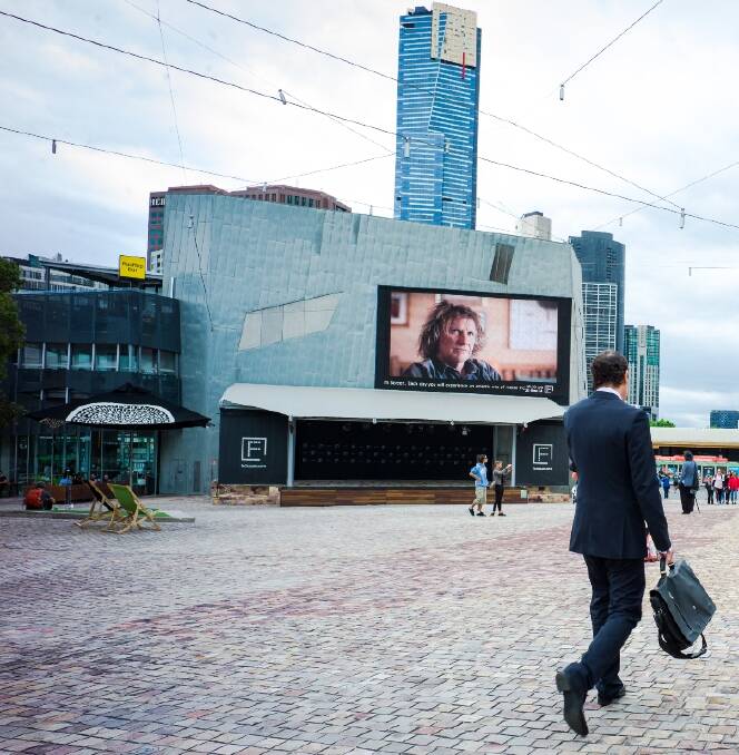Waterwheel's Peter Cumming on the screen at Federation Square. Picture courtesy Archivist Media