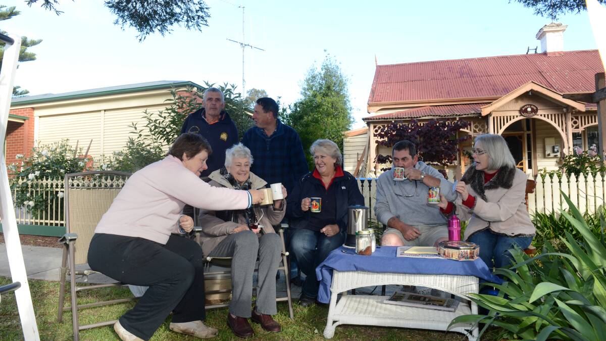 (back) Peter Rendell, Leo Nally with (front) Kerri Nally, Val Bolitho, Dianne Bolitho, Mark Bolitho and Gwenda Foggitt at the friendly neighbour garage sale on the Garage Sale Trail. Picture: JIM ALDERSEY