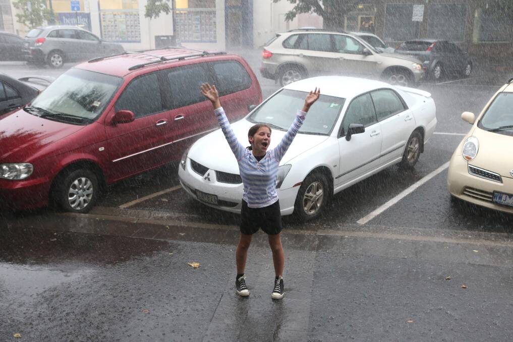Birchip's 11-year-old Pheobe Paley was jumping for joy as the rain started to fall on Friday. Picture: PETER WEAVING