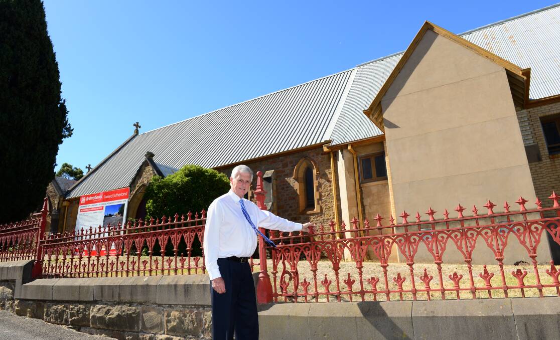 Real estate agent Craig Tweed in front of the All Saints Cathedral earlier this month. Picture: JIM ALDERSEY

