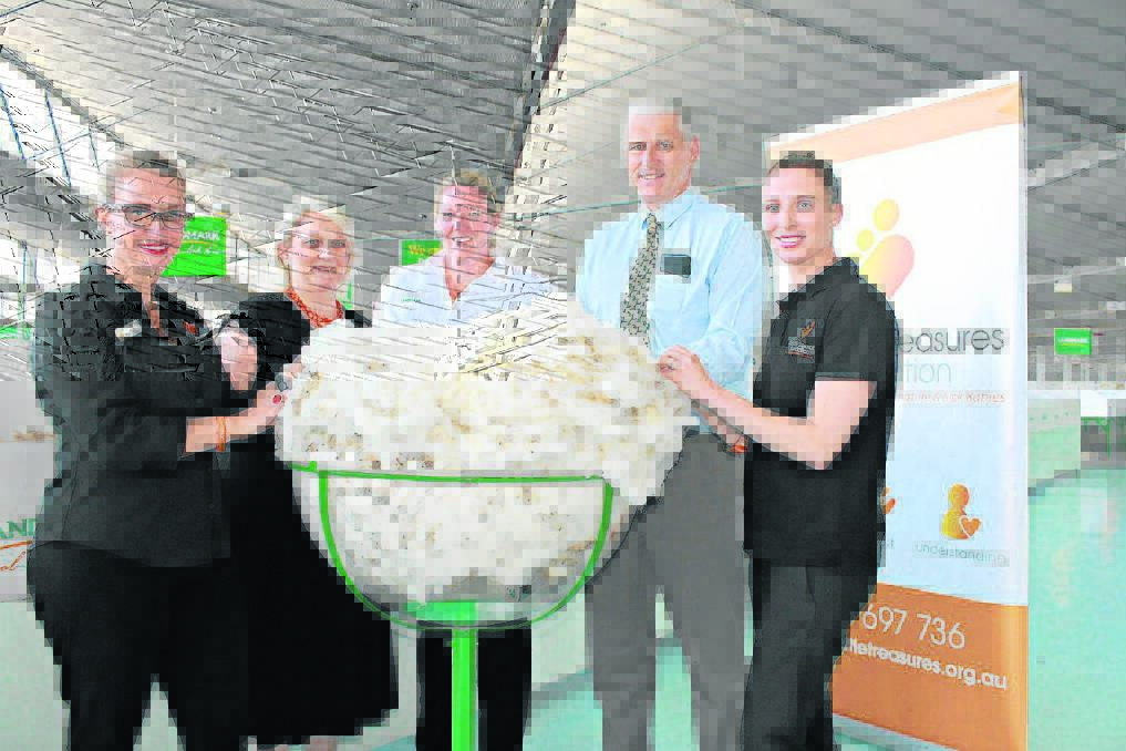 GOOD CAUSE: Life’s Little Treasures’ Kelli Hugo (left) and chief executive Shusannah Morris with Landmark Bendigo’s Candice Cordy, Australian Wool Testing Authority’s sampling operations manager for eastern Australia Tim Steere and Karen Peters. Picture: Contributed
