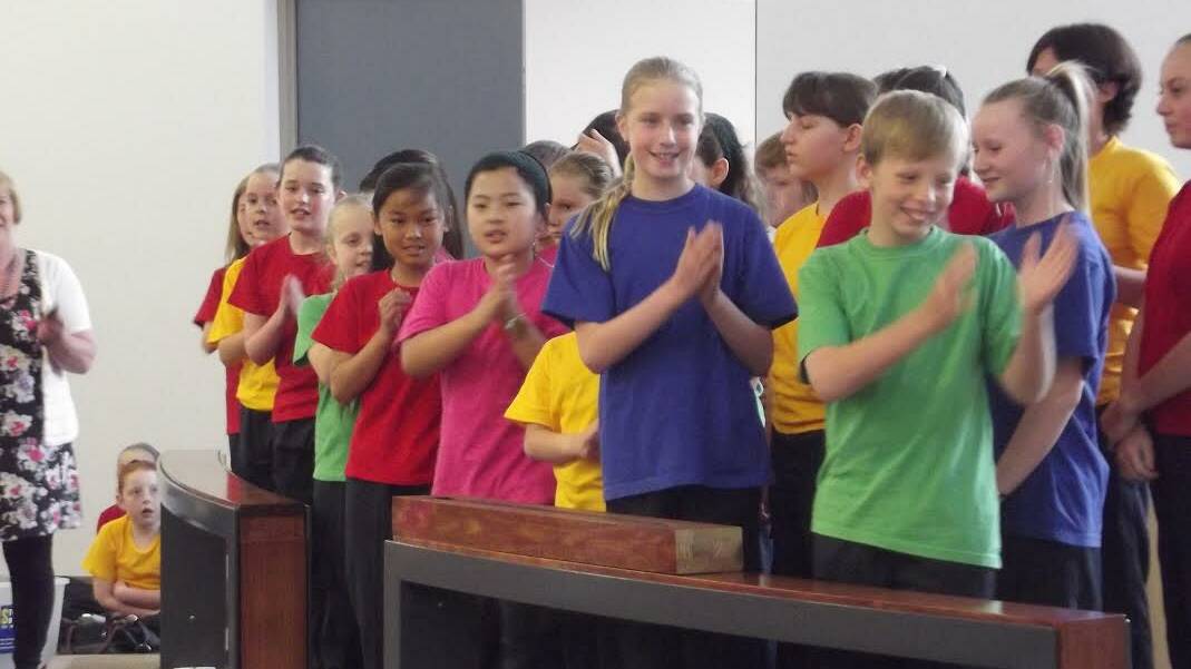 Kangaroo Flat Anglican Church’s is preparing for its annual parish fair this coming Saturday. Members of the Kangaroo Flat Primary School Choir are pictured performing at last year’s parish fair.  Picture: ALISON NIVEN