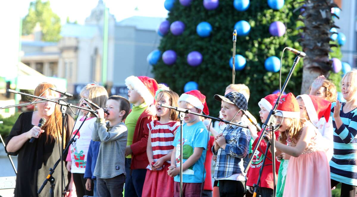JINGLE ALL THE WAY: Annie Galvin Kindergarten entertain the crowds. Picture: LIZ FLEMING