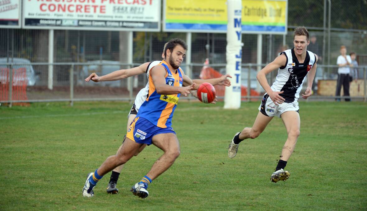 SNAP: Golden Square's Jacob Greenwood takes on the Maryborough defence at MyJet Oval. Picture: LIZ FLEMING