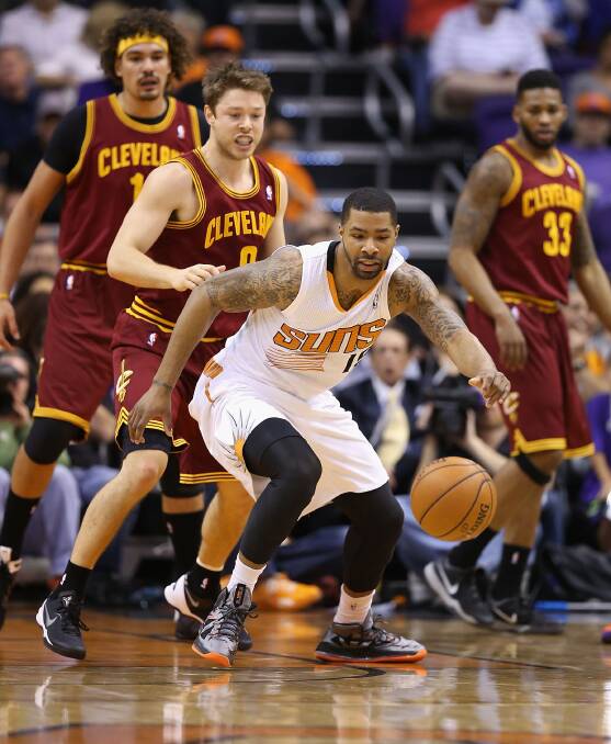 Matthew Dellavedova defends Phoenix Suns' guard Marcus Morris. Picture: GETTY IMAGES