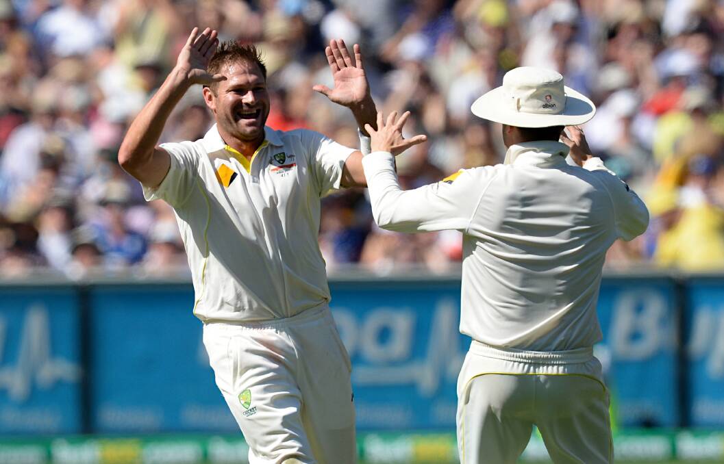 CELEBRATE: Ryan Harris celebrates the wicket of England star Ian Bell.