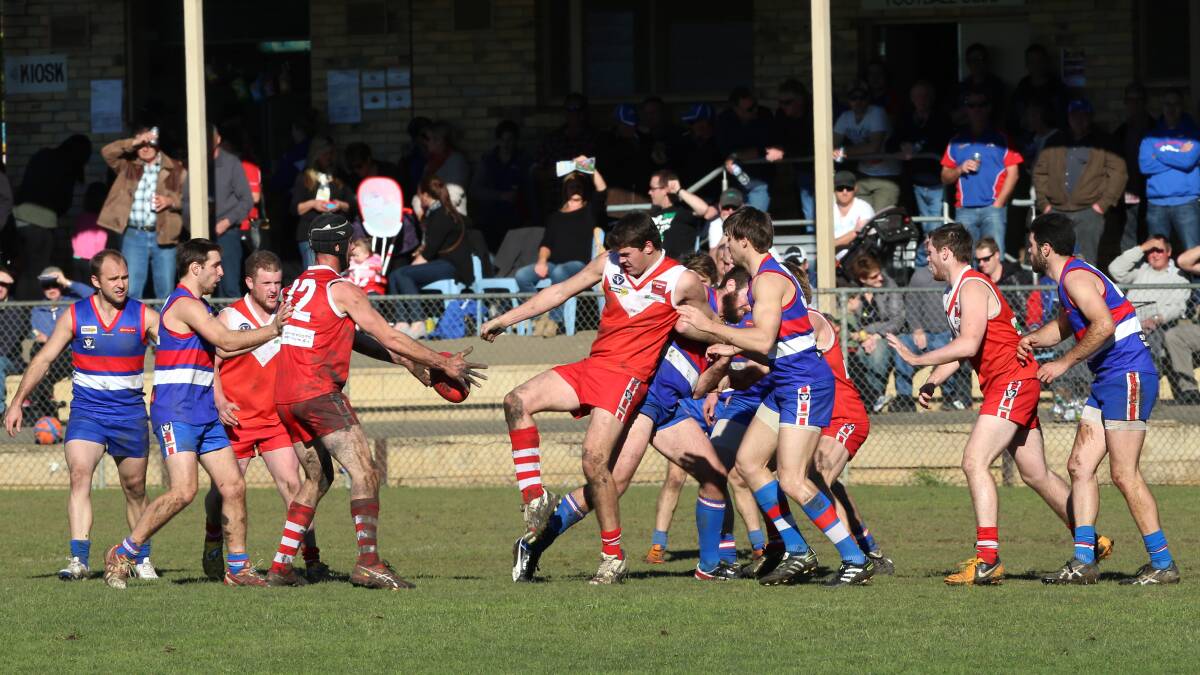 North Bendigo and Elmore players do battle in their round 15 clash. Picture: PETER WEAVING