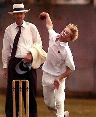 MEMORIES: David Warner bowling leg-spin in a junior carnival in Bendigo in front of umpire Kevin Crawford. Picture: SUPPLIED