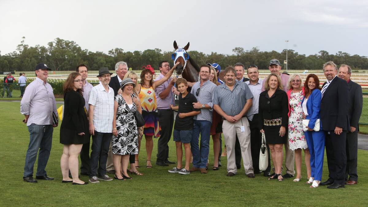 Fat Al's big group of owners celebrate the win. Picture: PETER WEAVING