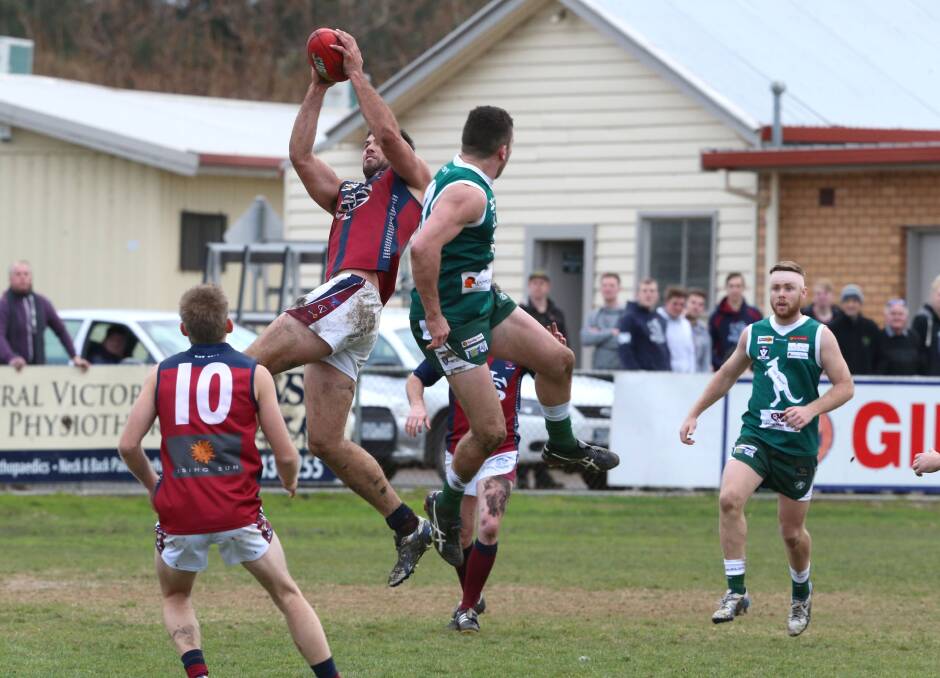 Tim Martin takes a strong mark against Kangaroo Flat in 2014.
