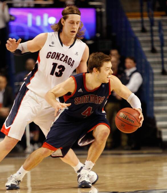 Delly takes on Gonzaga's Kelly Olynyk in January, 2013. Both players now feature in the NBA. Picture: GETTY IMAGES