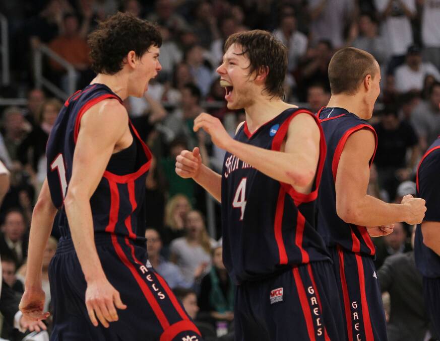 Delly celebrates with fellow Aussie Clint Stiendl after the win over Villanova. Picture: GETTY IMAGES
