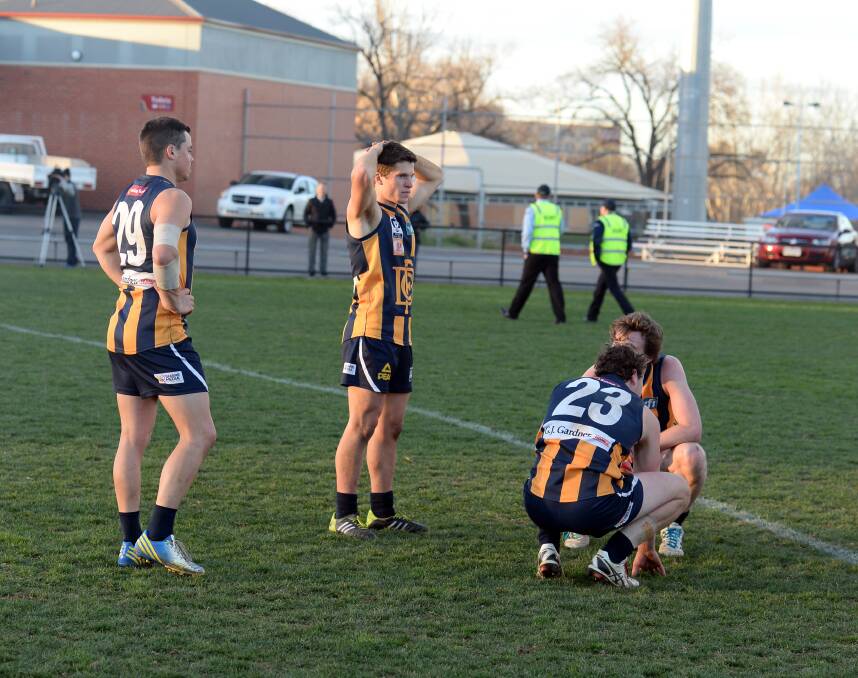 Bendigo Gold players after the two-point defeat. Picture: LIZ FLEMING