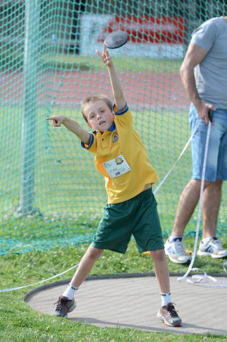 Max Rowe in the under-8 discus. 