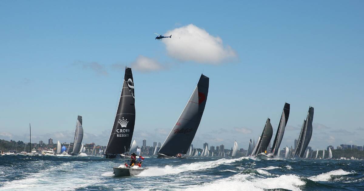 The Sydney to Hobart field makes its way out of Sydney Harbour. Picture: GETTY IMAGES
