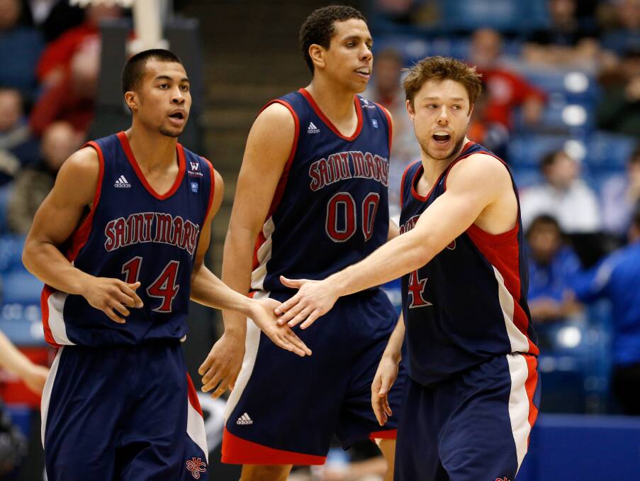 Stephen Holt, Brad Waldow and Delly in the Gaels' win over Middle Tennessee in March, 2013.