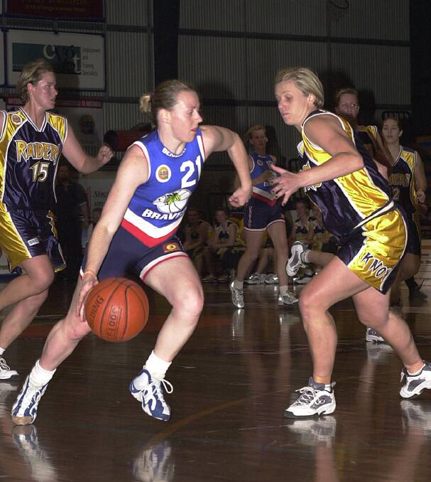 Leading the Bendigo Lady Braves to victory over Knox in 2000.