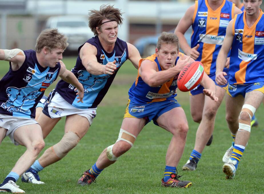 FIRST TO THE FOOTY: Golden Square's Henry Anderton leads the race for the ball against Eaglehawk. Picture: LIZ FLEMING