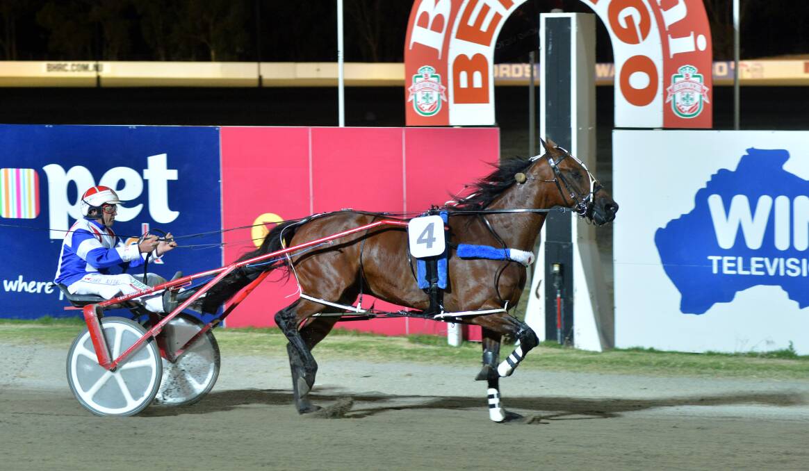 BOLTED IN: Im Corzin Terror takes out the Bendigo Pacing Cup in fine style. Picture: JODIE DONNELLAN