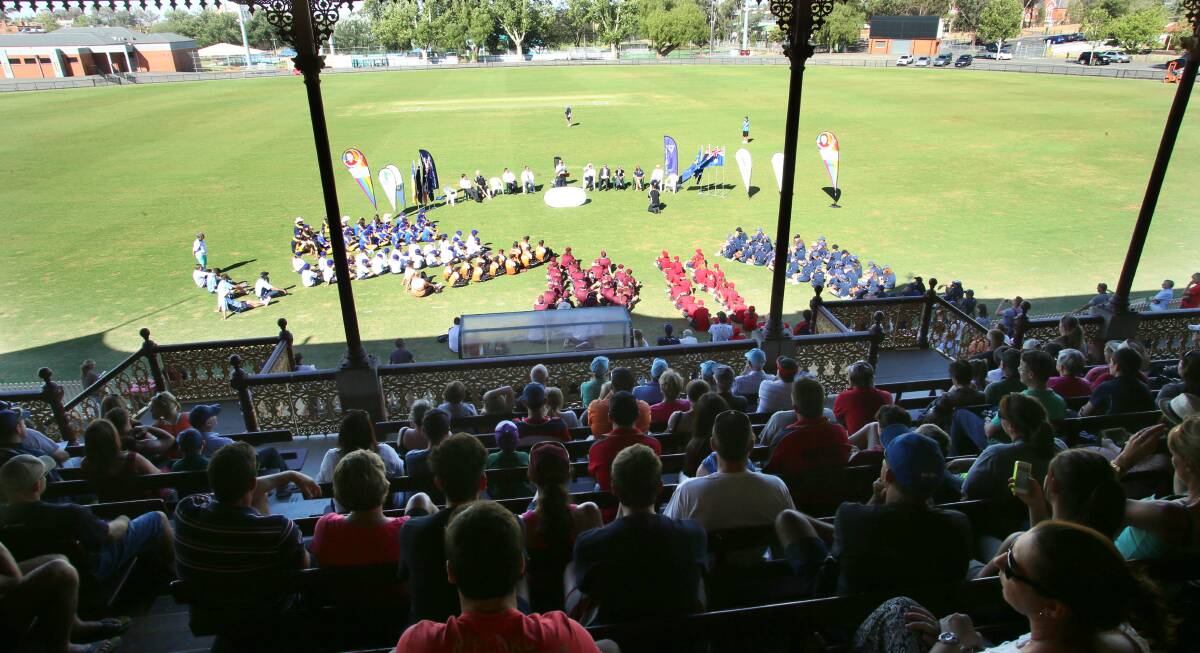 CENTRE STAGE: Players and spectators at the QEO for the SSA 12-and-under cricket championships. 
