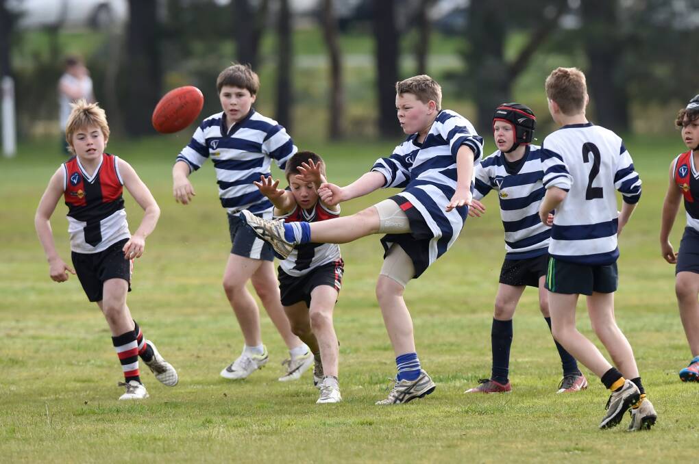 Action from the Holy Rosary versus Castlemaine Cluster clash. Picture: JODIE DONNELLAN
