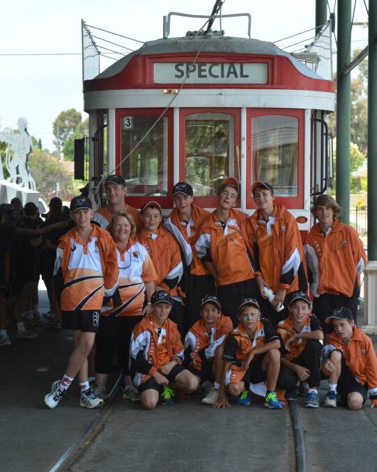 The Northern Territory squad get ready to ride the tram.