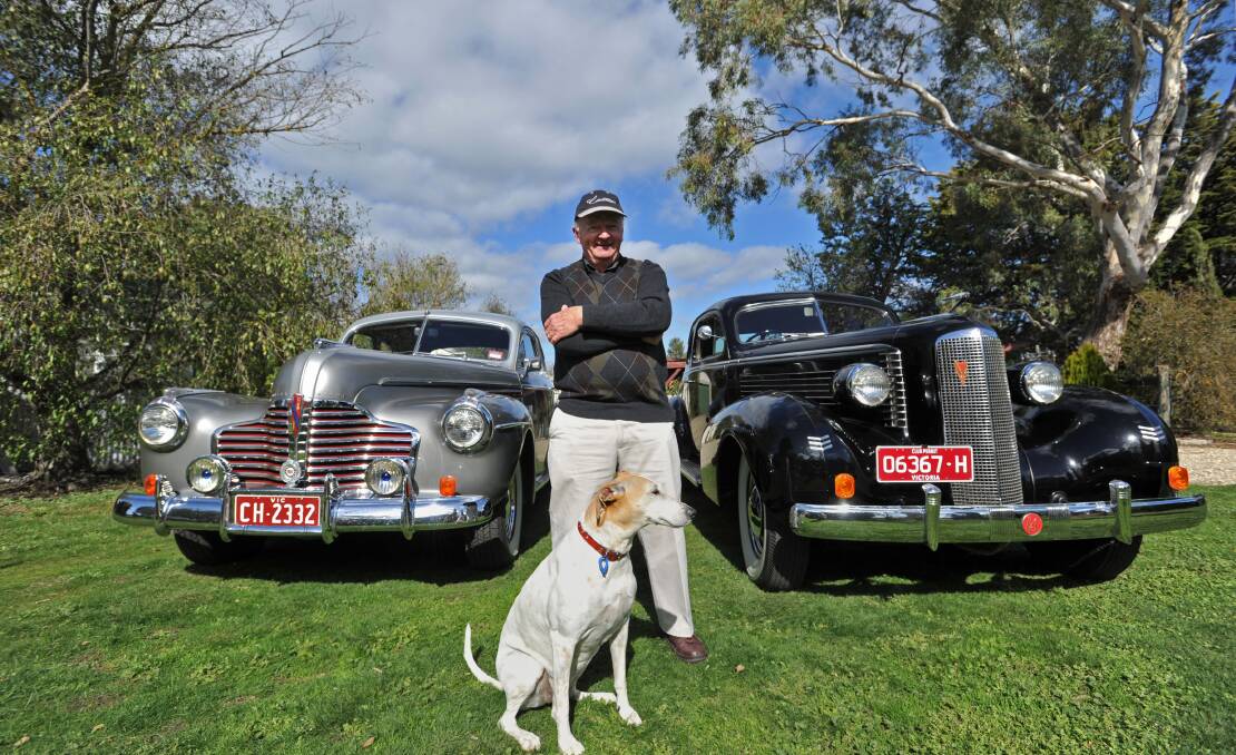 VINTAGE: Geoff Pollard with his dog Winnie and his 1941 Buick Eight and 1937 Cadillac LaSalle. Pictures: JODIE DONNELLAN 