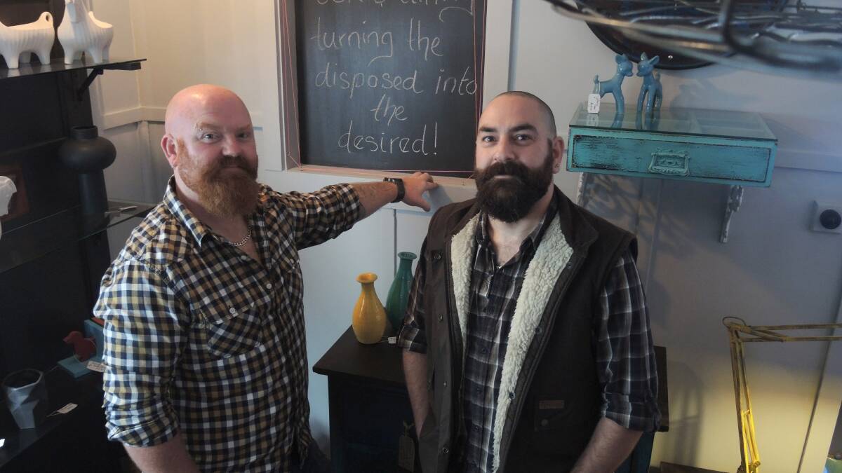 CREATOR: Business owner Rustin Simpson with creative assistant Dax Duggan. Picture: GRACE SERPELL