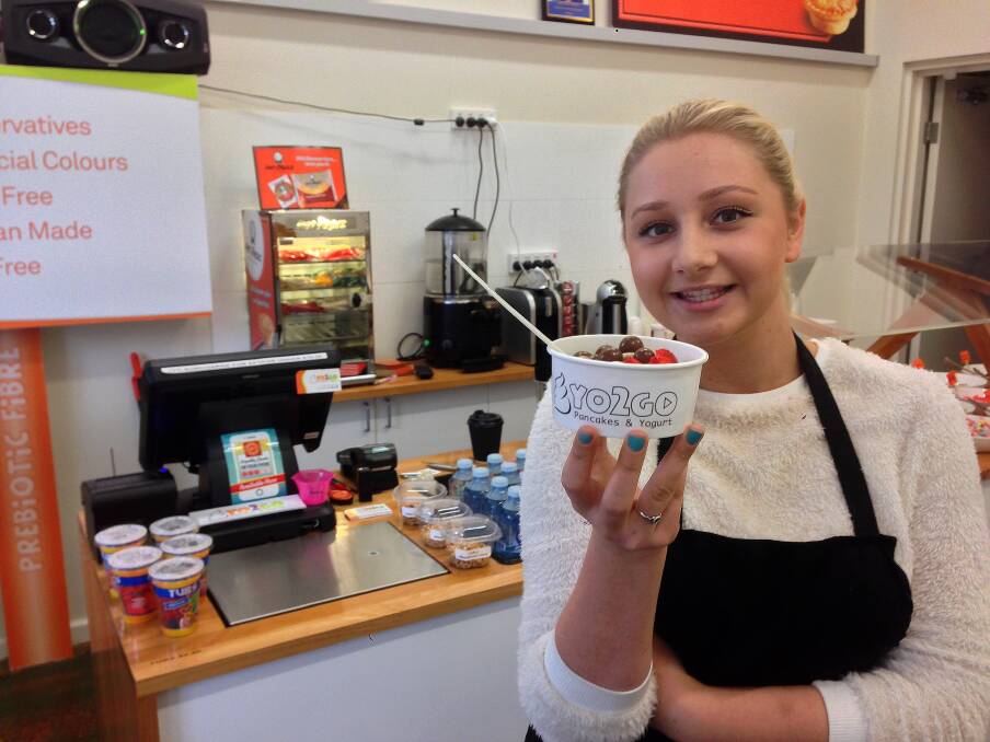 YUMMY: Brooke Hamilton with one of many yoghurt combinations. Picture: GRACE SERPELL