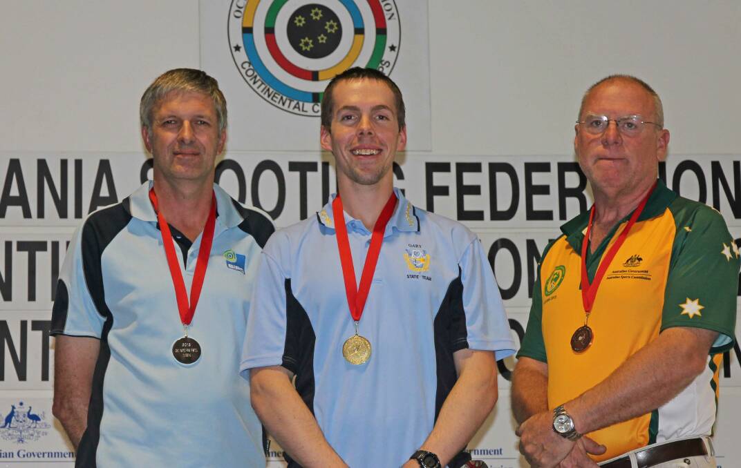 NUMBER ONE: Castlemaine shooter Gary Mullens (centre) won the Oceania Shooting Federation Continental Championships in Sydney. Picture: SUPPLIED