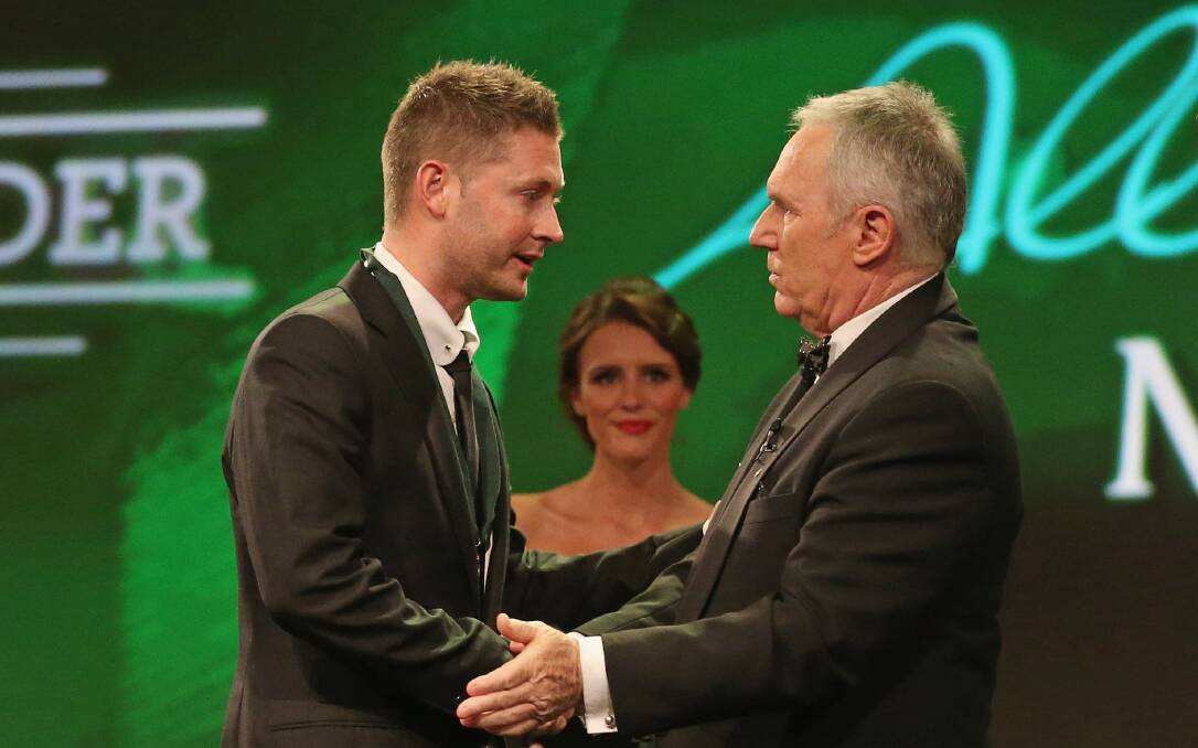 Michael Clarke and Allan Border. Picture: GETTY IMAGES