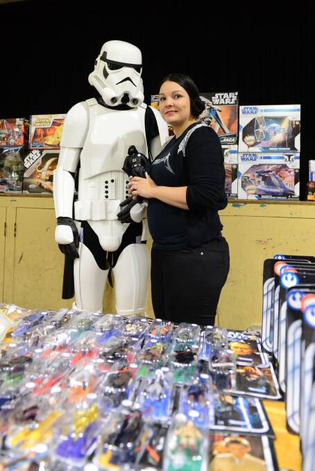 HALT: Samantha Hanna with a Star Wars stormtrooper. Picture: LIZ FLEMING
