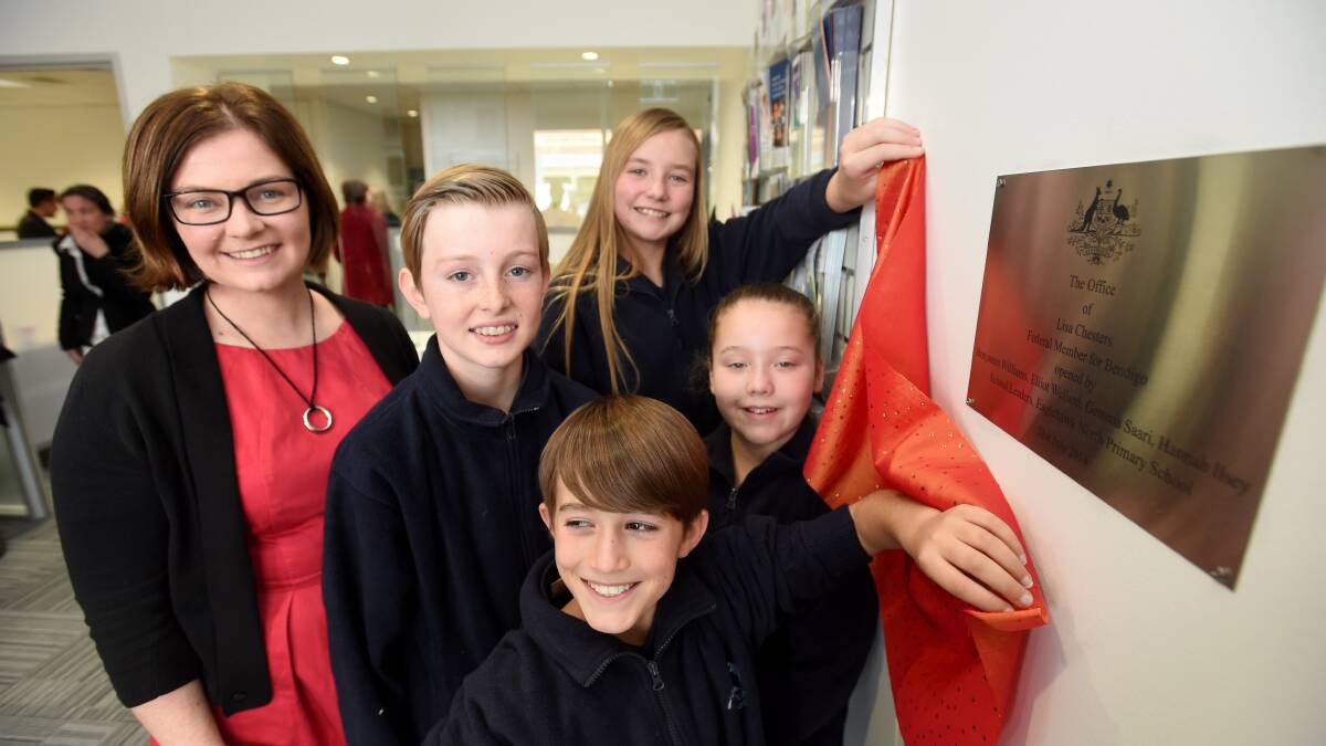  OPENING: Lisa Chesters with Eaglehawk North Primary School students Benjamin Williams, Hannah Ilsley, Gemma Saari amd Elliot Wellard who assisted with the opening. Picture: JODIE DONNELLAN