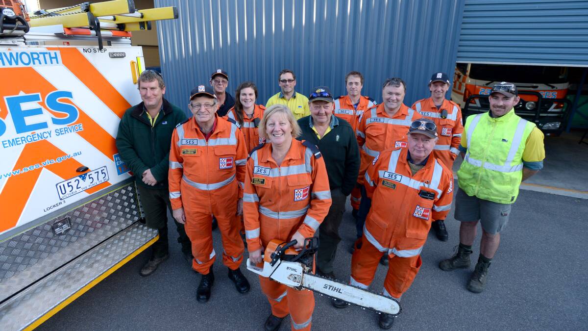 HELPING: The team of volunteers sent to Melbourne to help with clean up and safety operations. Picture: JIM ALDERSEY