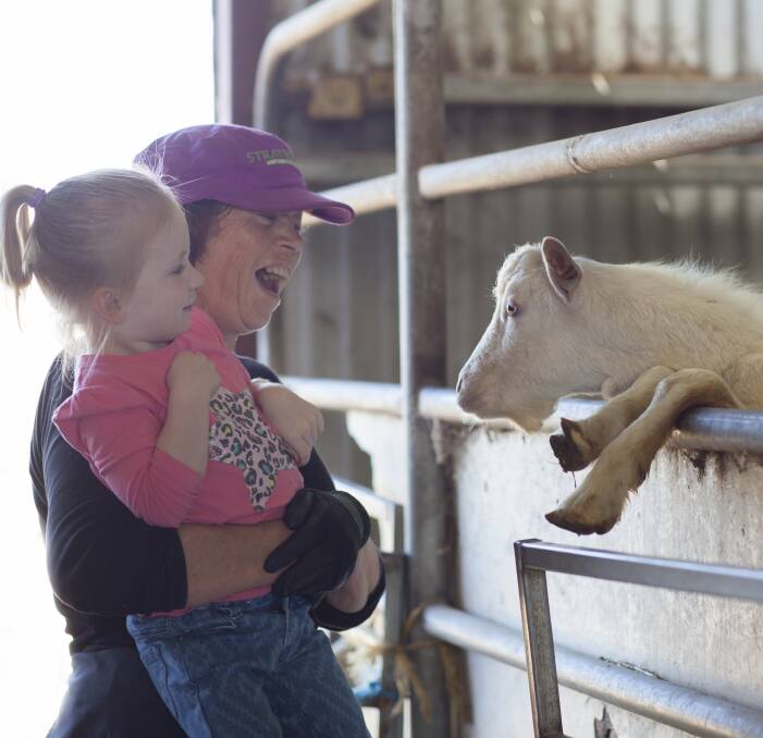 GIGGLES: Brenda Leeds and Sienna Keen at the goat farm. Picture: CONTRIBUTED 
