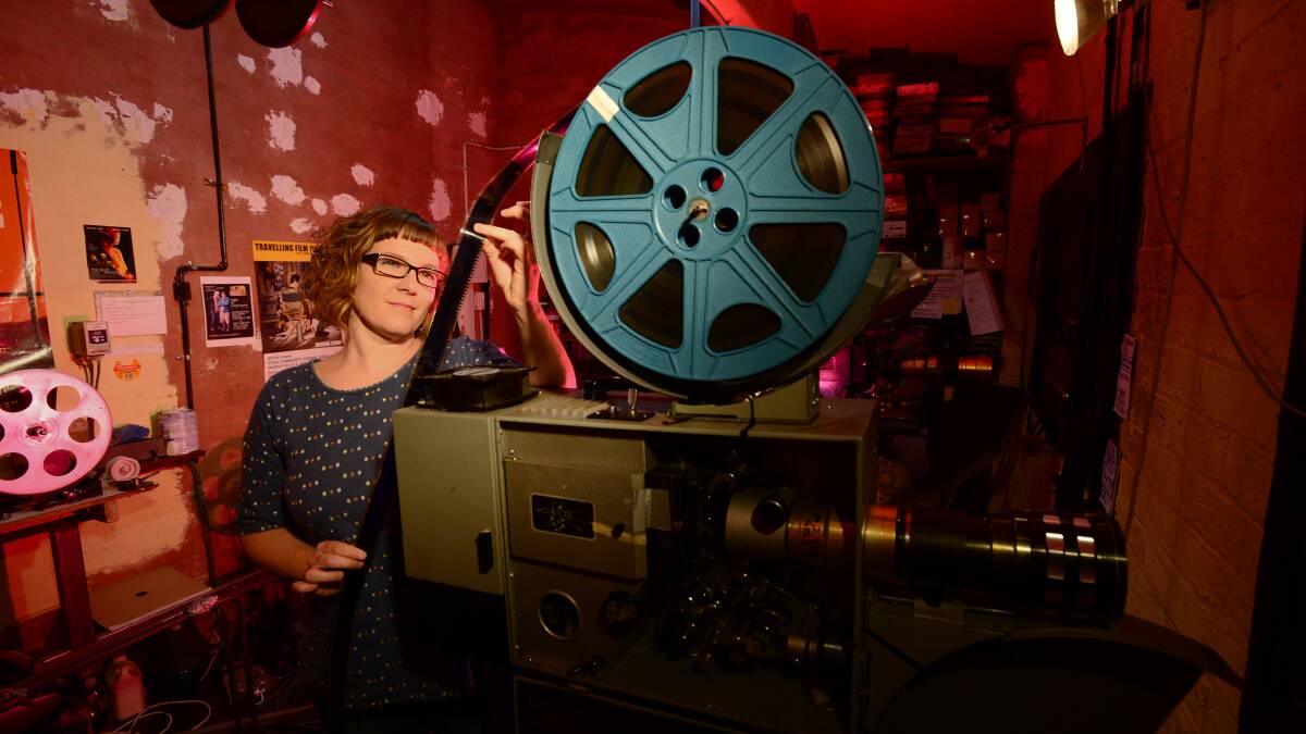 UPGRADE: Star Cinema manager Hannah Morton with the analogue film projector.  Picture: JIM ALDERSEY
