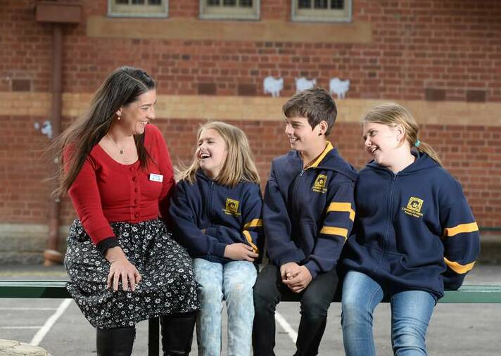 SECULAR: Prue Robertson with students.
