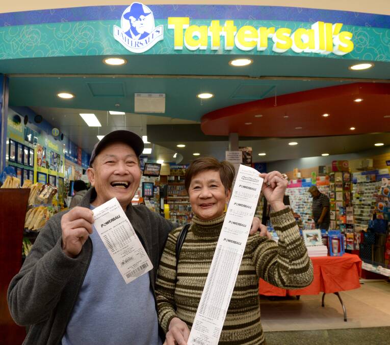 CHA CHING: Ray and Fely Caligdong are hoping their numbers come good in Thursday night's $50 million draw. Picture: JIM ALDERSEY