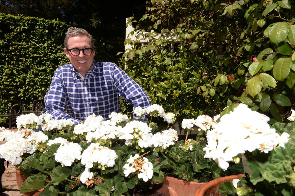 KILLED: Stuart Rattle poses for a promotional photo for an event to raise money for further restoration of Wombat Hill Botanic Gardens in Daylesford. Picture: FAIRFAX