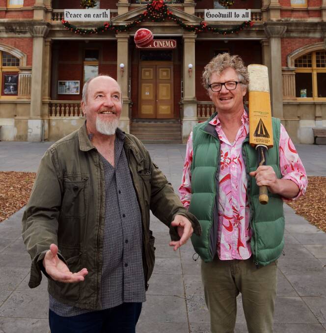 PLAY BALL: Backyard Ashes co-writer and producer Peter Cox and actor Andrew Gilbert out the front of Star Cinema. Photo: PETER WEAVING