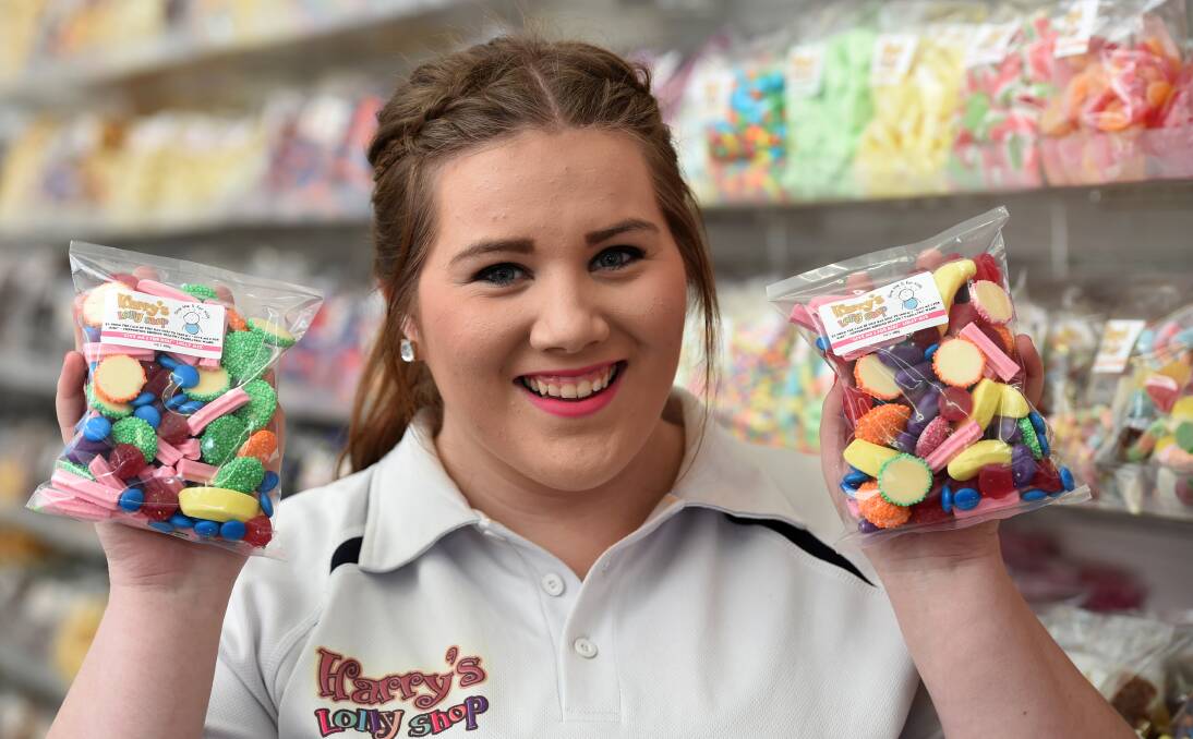 SWEET DEAL: Monique Bailey from Harry's Lolly Shop with some of the lollies available.
